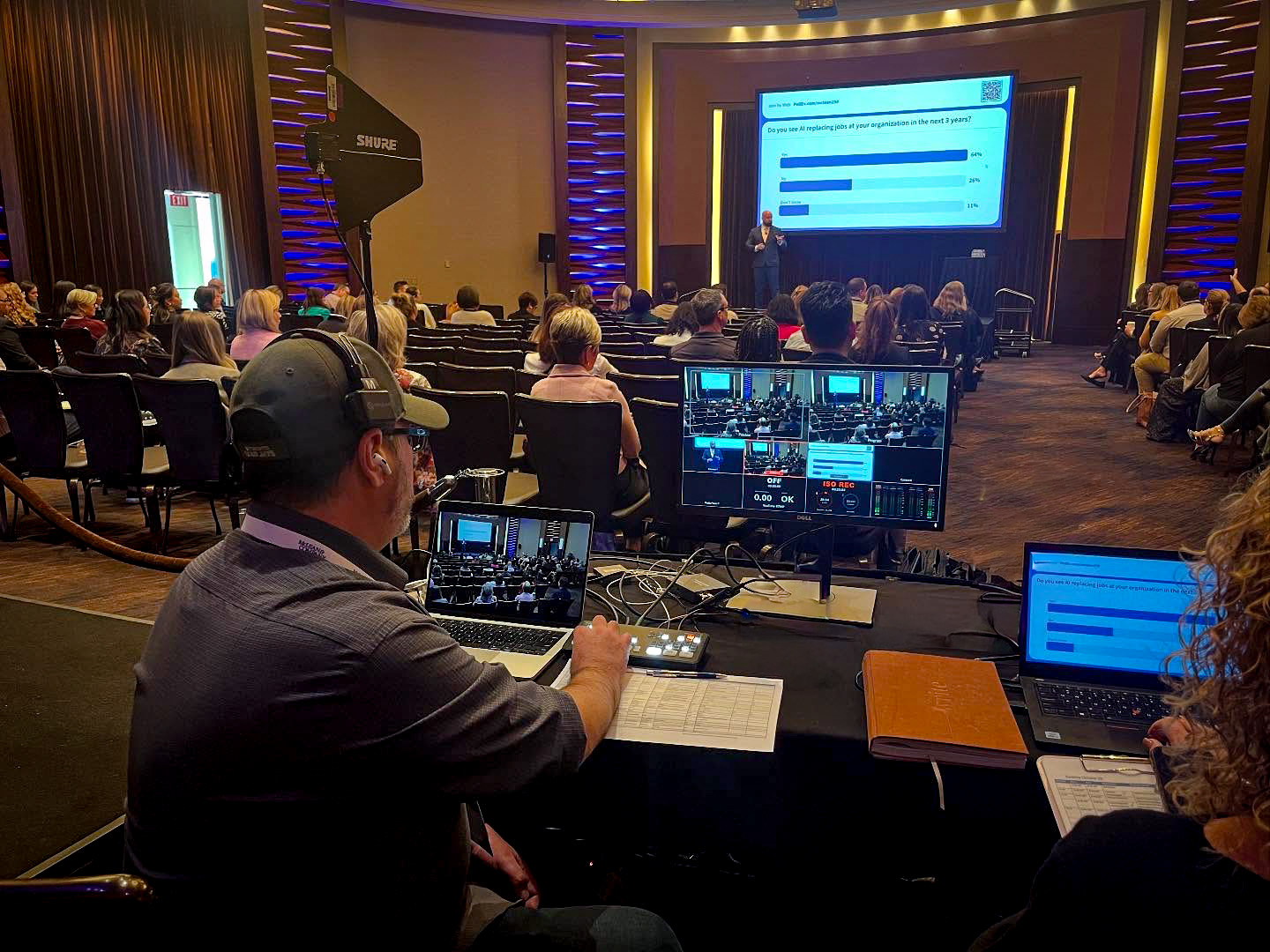 Professional AV production team supporting a corporate conference
